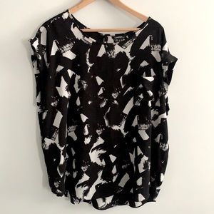 Women’s blouse with front pocket.
